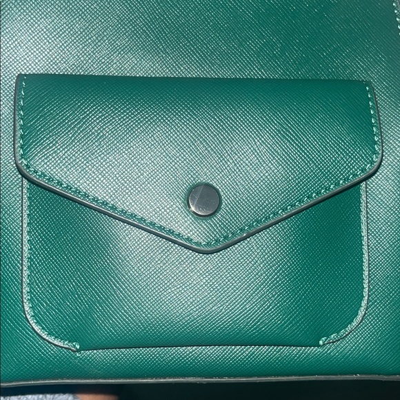 Kate Spade Schuyler mini backpack in the color Deep Jade green. - Picture 12 of 13